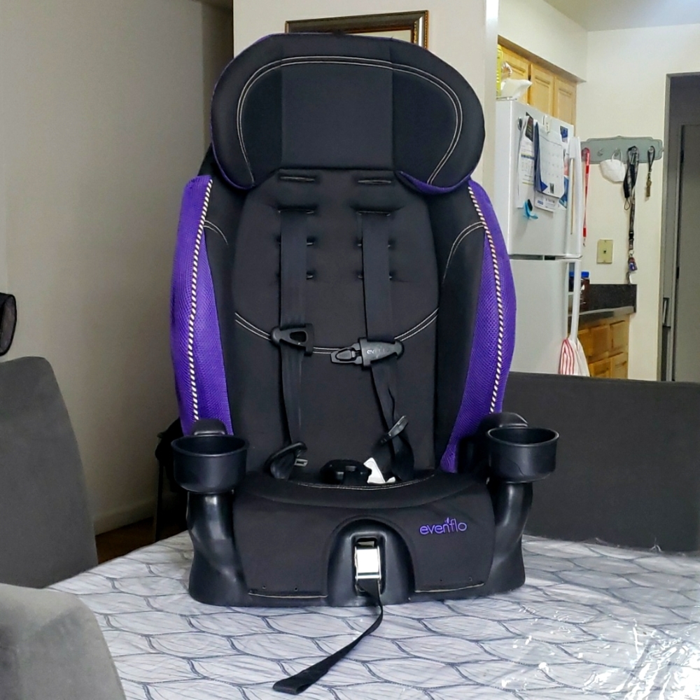 Black and purple Evenflo booster seat